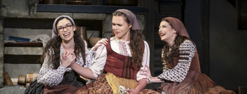 Chava, Tzeitel, and Hodel sit on the floor together in Fiddler on the Roof