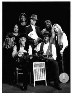 The cast of It Ain't Nothin But the Blues poses together with their instruments