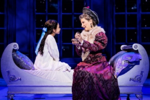 Little Anastasia sits in bed as the Dowager Empress presents her with a music box