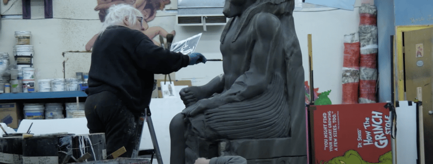 Scenic Artist Lori Worthman sculpts a replica of an Egyptian statue