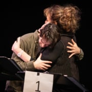 Jake Horowitz and Carline Aaron embrace during rehearsal for the reservoir