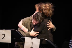 Jake Horowitz and Carline Aaron embrace during rehearsal for the reservoir