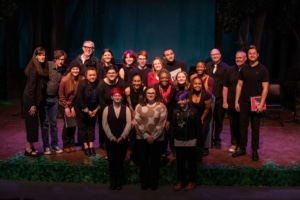 The casts and creative teams for the High School Playwriting staged readings pose for a photo together