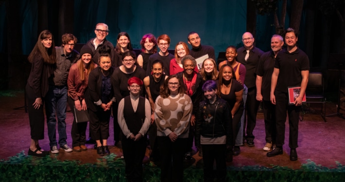 The casts and creative teams for the High School Playwriting staged readings pose for a photo together