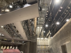 Hundreds of lights hang above the Wolf Theatre stage