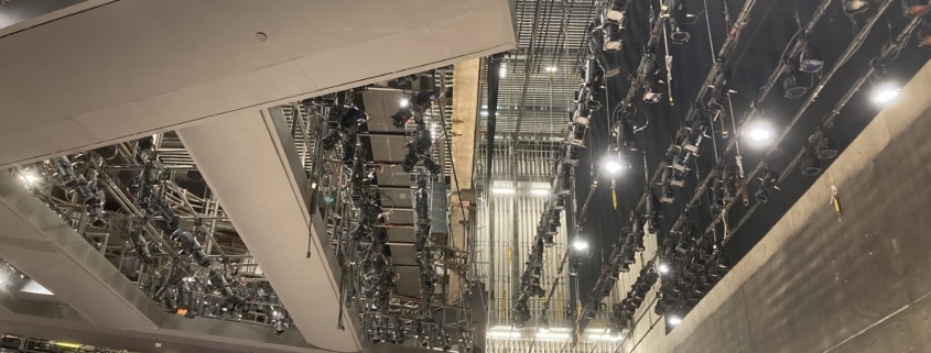 Hundreds of lights hang above the Wolf Theatre stage