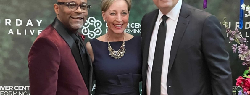 Mayor Michael B. Hancock, DCPA President and CEO Janice Sinden, and DCPA Board Chair Hassan Salem pose for a photo at Saturday Night Alive