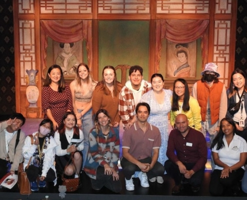 UC Denver Students and the cast of The Chinese Lady pose for a photo together onstage