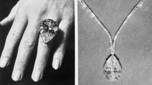 On the left, a hand displays the Taylor-Burton diamond on her ring finger. On the right, the diamond hangs from a diamond encrusted chain