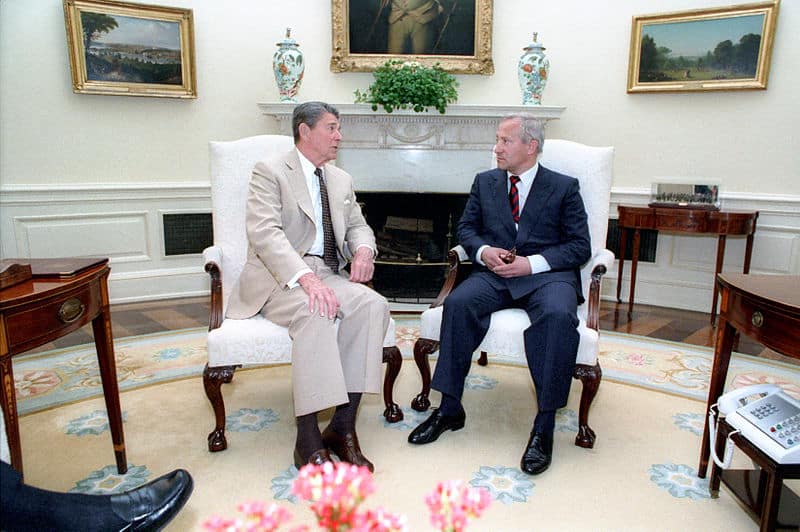 President Ronald Reagan and Oleg Gordievsky sit together in the Oval Office