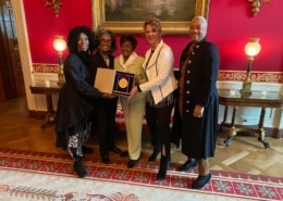 The five founders of IABD pose with their medal of the arts in the White House
