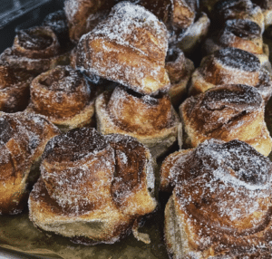 Piles of sugar coated sticky buns at Bakery Four