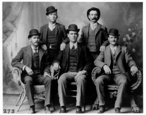 A group photo of five outlaws, the Wild Bunch