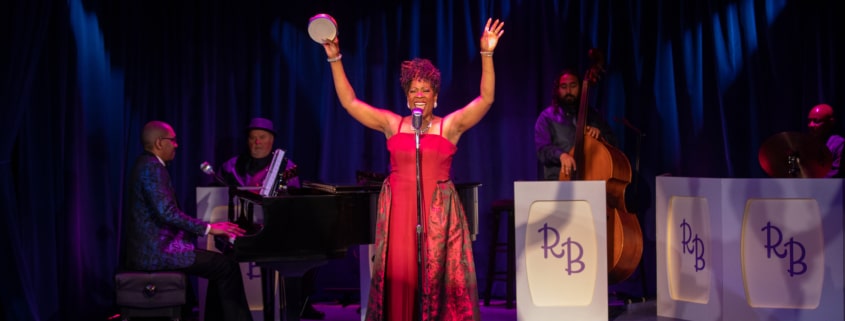 Sheryl McCallum poses as she sings onstage in Miss Rhythm - The Legend of Ruth Brown