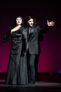 Two students portraying Morticia and Gomez Addams perform in ThunderRidge High School's The Addams Family during the Bobby G Awards