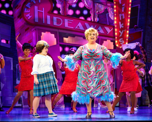 Welcome to the 60s (Nov 23) - (from L) Caroline Eiseman as “Tracy Turnblad,” Greg Kalafatas as “Edna Turnblad” and Company in Hairspray. Photo: Jeremy Daniel.