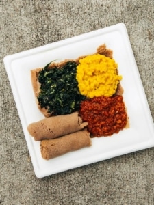 Konjo's Ethiopian food arranged neatly on a square plate