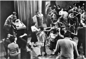 Dick Clark at the podium during American Bandstand