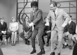 Lloyd Thaxton dances with a guest