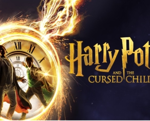 Show logo for the play 'Harry Potter and the Cursed Child,' featuring the text 'CURSED CHILD' at the bottom, with a dark background and fiery elements on the left side.