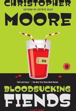 ook cover of Bloodsucking Fiends by Christopher Moore, featuring a glass of red liquid with two straws and a label reading 'AB'.