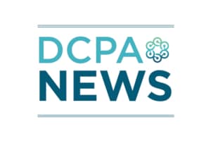 An image in various shades of teal that says DCPA News and includes the circular logo of the Denver Center for the Performing Arts