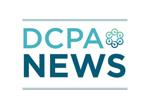 An image in various shades of teal that says DCPA News and includes the circular logo of the Denver Center for the Performing Arts