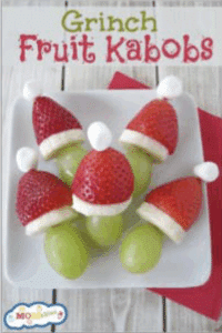 Gruit kabobs made with miniature marshmallow, strawberries, banana slice and grape