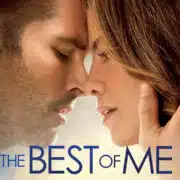 Movie cover for "The Best of Me" showing a close-up of two people embracing, with one hand gently touching the other’s hair. The title appears in large blue text at the bottom.