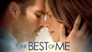 Movie cover for "The Best of Me" showing a close-up of two people embracing, with one hand gently touching the other’s hair. The title appears in large blue text at the bottom.