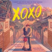 Illustrated cover for XOXO showing a couple embracing and kissing in the middle of a quiet street lined with traditional Korean buildings at sunset.