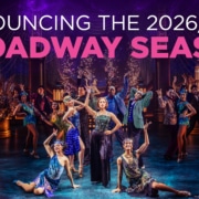 Colorful theatrical cast performing a lively dance number on a grand, art‑deco–inspired stage, with bold text above reading ‘Announcing the 2026/2027 Broadway Season.’ Bright costumes, dramatic lighting, and ornate set pieces create an energetic Broadway atmosphere.