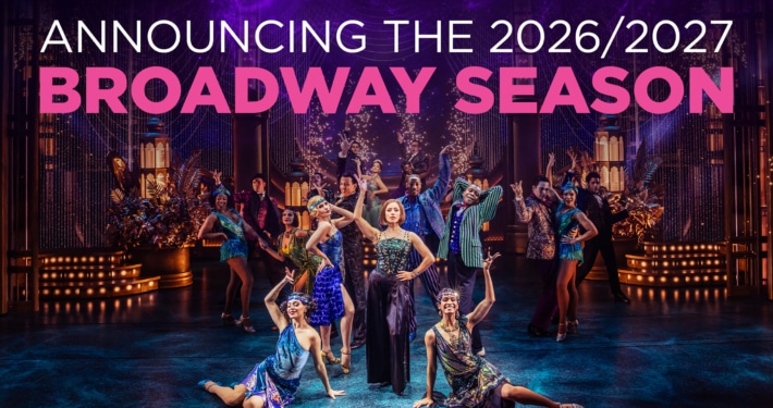 Colorful theatrical cast performing a lively dance number on a grand, art‑deco–inspired stage, with bold text above reading ‘Announcing the 2026/2027 Broadway Season.’ Bright costumes, dramatic lighting, and ornate set pieces create an energetic Broadway atmosphere.