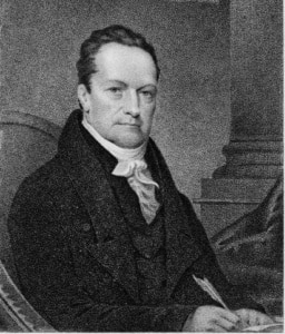 Historic 19th‑century engraved portrait of a seated figure in formal attire