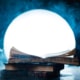 An open book of spells in full Moon. Reader imagination and writing inspiration concept with copy space