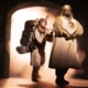 Medieval comedy scene from Monty Python’s Spamalot musical featuring knights and a traveler entering a castle