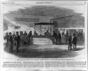 Historic engraving depicting the interior of a 19th-century banking house in Denver City. Numerous people gather around a central teller counter, while signs for banking and express services are visible throughout the room.